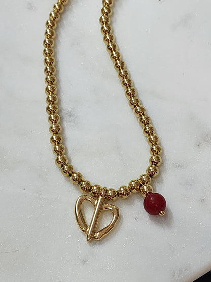 Collar de Corazón con piedra Roja.